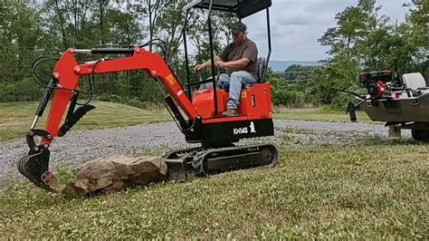 groundhog mini excavator videos